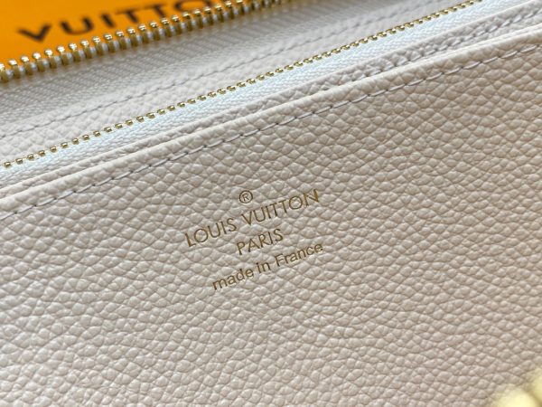 Zippy Wallet – Where Luxury Meets Functionality. Presenting the exquisite Zippy wallet, a coveted piece from the LV Gradient collection for this season. Meticulously fashioned using grained, embossed Monogram Empreinte leather, it showcases a gracefully transitioning spectrum of summery hues. This iconic wallet is distinguished by its sleek, slender profile, dependable zip closure, and ingeniously designed interior replete with an array of card slots, pockets, and compartments, ensuring both style and functionality in one harmonious package.