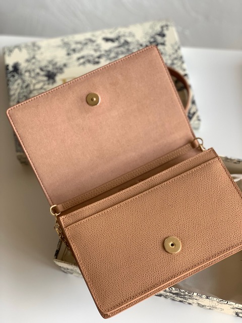 DIOR 30 Montaigne 2-in-1 Pouch. Original Quality Pouch including gift box, care book, dust bag, authenticity card. This pouch depicts a versatile design that features a 'CD' element at the front to capture the signature look of the 30 Montaigne line. A single interior compartment is accented by 4 card slots, 1 zip pocket, and 2 patch pockets. The piece can be worn as a belt, over the shoulder, crossbody, or carried as a clutch.