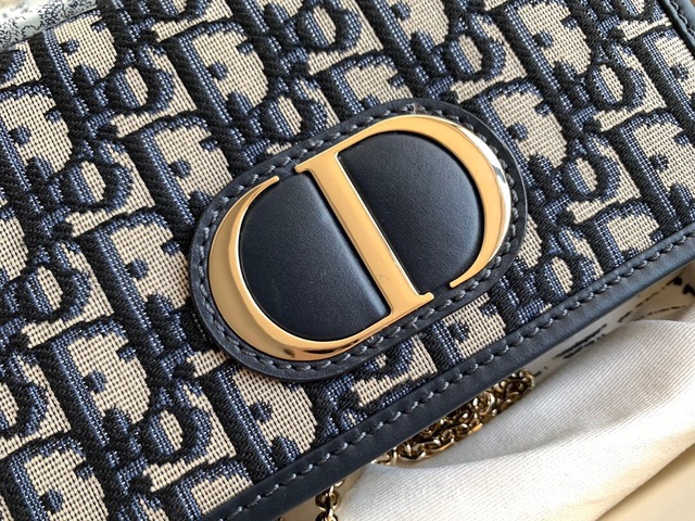 DIOR 30 Montaigne 2-in-1 Pouch. Original Quality Pouch including gift box, care book, dust bag, authenticity card. This pouch depicts a versatile design that features a 'CD' element at the front to capture the signature look of the 30 Montaigne line. A single interior compartment is accented by 4 card slots, 1 zip pocket, and 2 patch pockets. The piece can be worn as a belt, over the shoulder, crossbody, or carried as a clutch.