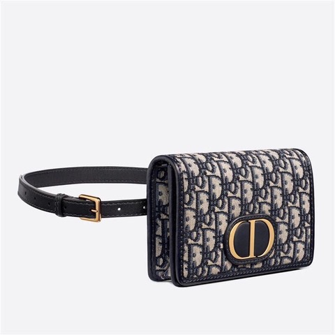 DIOR 30 Montaigne 2-in-1 Pouch. Original Quality Pouch including gift box, care book, dust bag, authenticity card. This pouch depicts a versatile design that features a 'CD' element at the front to capture the signature look of the 30 Montaigne line. A single interior compartment is accented by 4 card slots, 1 zip pocket, and 2 patch pockets. The piece can be worn as a belt, over the shoulder, crossbody, or carried as a clutch.