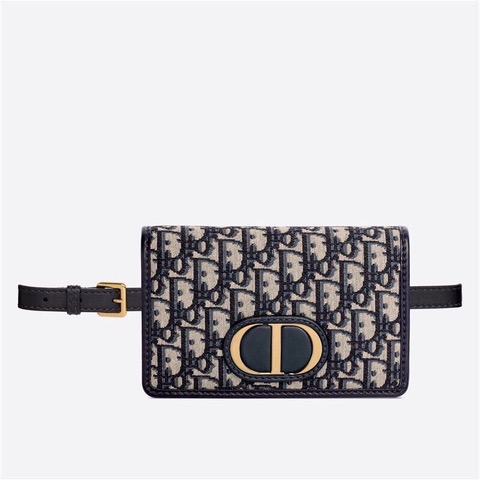 DIOR 30 Montaigne 2-in-1 Pouch. Original Quality Pouch including gift box, care book, dust bag, authenticity card. This pouch depicts a versatile design that features a 'CD' element at the front to capture the signature look of the 30 Montaigne line. A single interior compartment is accented by 4 card slots, 1 zip pocket, and 2 patch pockets. The piece can be worn as a belt, over the shoulder, crossbody, or carried as a clutch.