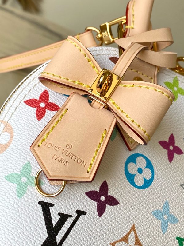 LV x TM Alma BB. Authentic quality luxury bag crafted in genuine leather comes with authenticity card, dust bag and gift bag. A Timeless Icon Reimagined in Murakami’s Playful Palette. Inspired by a 1930s Art Deco design, this special edition of the Alma BB exudes a celebratory charm with its vibrant multicolored Monogram coated canvas from the Louis Vuitton x Murakami collection. Drawing from the Japanese artist’s playful palette, the design is beautifully complemented by the House’s signature natural cowhide leather, which graces the refined Toron top handles, structured base, removable strap, and the exclusive LV x TM keybell—adding a timeless touch of elegance.LV x TM Alma BB. Authentic quality luxury bag crafted in genuine leather comes with authenticity card, dust bag and gift bag. A Timeless Icon Reimagined in Murakami’s Playful Palette. Inspired by a 1930s Art Deco design, this special edition of the Alma BB exudes a celebratory charm with its vibrant multicolored Monogram coated canvas from the Louis Vuitton x Murakami collection. Drawing from the Japanese artist’s playful palette, the design is beautifully complemented by the House’s signature natural cowhide leather, which graces the refined Toron top handles, structured base, removable strap, and the exclusive LV x TM keybell—adding a timeless touch of elegance.