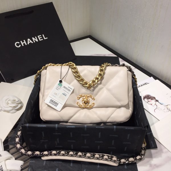 CHANEL '19' Flap Bag. High-end quality bag including gift box, literature, dust bag, authenticity card. Chanel's newest bag was designed along with Virginie Viard, and it made its debut on the runway of Paris Fashion Week earlier this year. The bag, called the Chanel 19 Bag, is aptly named after its birth year, and it is said to be inspired by the classic 2.55 bag.