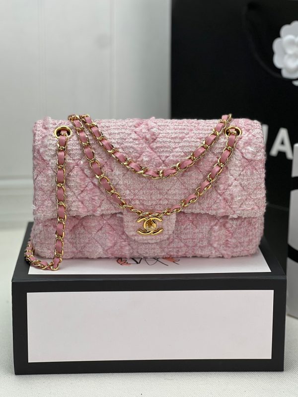 CHANEL Classic Tweed Flap Bag. Original Quality Bag including gift box, care book, dust bag, authenticity card.  These new bright and colorful bags are literally heart-melting. The woven chain, diamond quilting patters are the center of this collection.  Then we have the seasonal bags that look like the Classic Flap Bags but they features colorful cotton tweed for more brightness. These are the must-have seasonal bags.