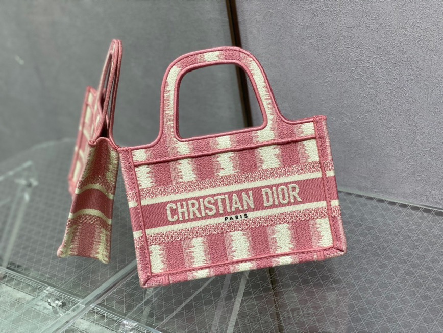 DIOR Mini Book Tote. Original Quality Bag including gift box, care book, dust bag, authenticity card. The Dior Book Tote, as imagined by Maria Grazia Chiuri, has become an essential item of the Dior aesthetic. The silhouette is fully embroidered. A prime example of Dior savoir-faire, the miniature bag may be carried by hand and can be paired with other Dior Oblique creations.