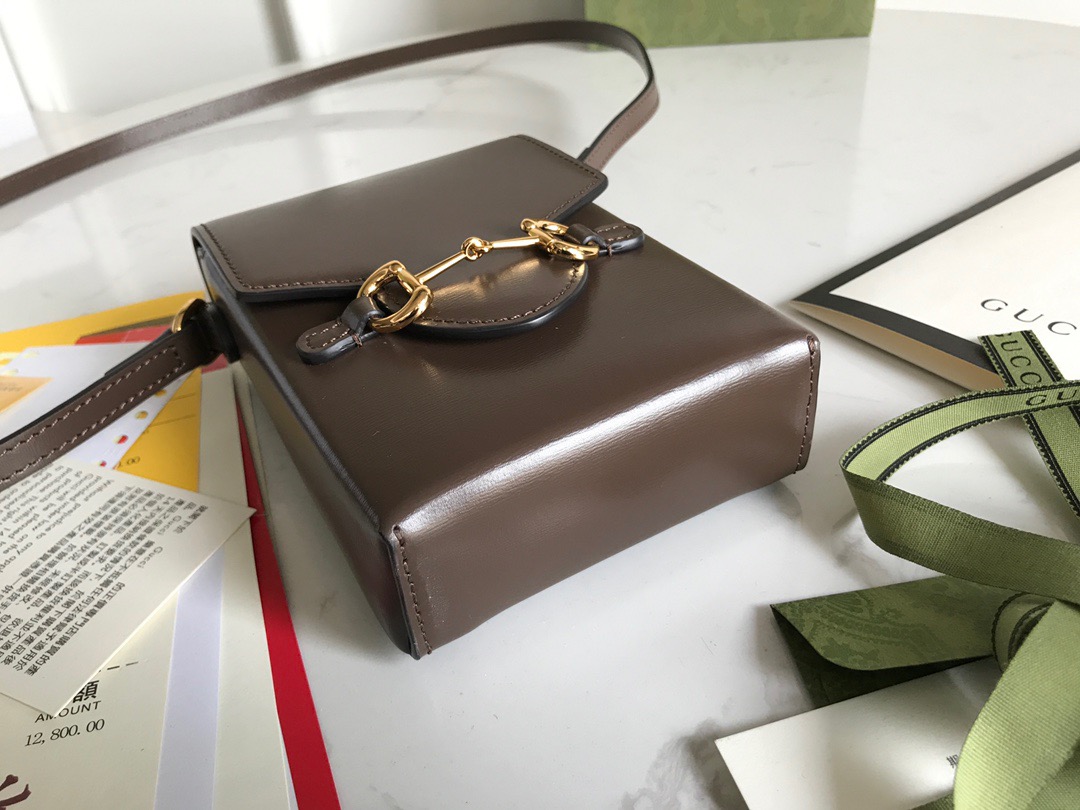 GUCCI Horsebit 1955 Mini Bag. Original Quality Bag including gift box, care book, dust bag, authenticity card. Presented in a petite rectangular shape, this mini bag is introduced for Pre-Fall 2020 in brown leather. Inspired by archival designs, the accessory highlights the double ring and bar design that has been established as one of the most distinctive elements among the House symbols borrowed from the equestrian world. Pieces with versatile ways to wear and style embrace each person who is part of the House’s individual spirit.