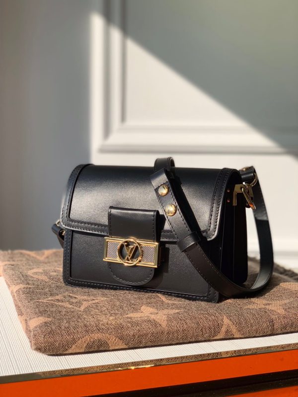 LOUIS VUITTON Mini Dauphine Crossbody and Shoulder Bag. Original Quality Bag including gift box, literature, dust bag, authenticity card. LOUIS VUITTON is expanding its Dauphine family with the Lugano Mini. In smooth calfskin leather, it features striking new signature touches like a gold LV circle lock trimmed with silver guilloche. Refined, elegant styling and convenient carry options make this bag a must-have for Dauphine lovers.