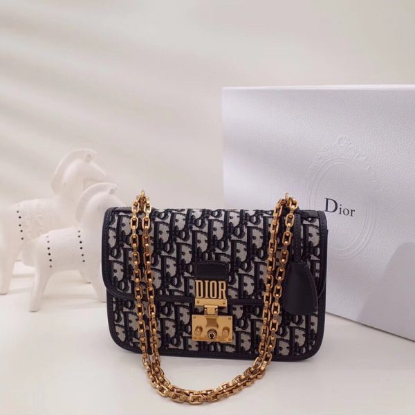 DIOR Vintage Oblique Canvas  'DiorAddict' Small Shoulder and Crossbody Bag. Original Quality Bag. Authentic cowhide trim and jacquard canvas. Leather. Metal Toned Hardware. DIOR Sales Box and Dust Bag. Booklet, Authenticity Card, Payment Slip. We are introducing the Dior Oblique Signature Canvas Bags. This pattern has taken its inspiration from Dior’s vintage design from the 70s. It was first introduced in the brand’s Fall/Winter 2017 Collection. It is made of jacquard canvas called Flanders Tapestry. The canvas comes with blue smooth calfskin details with aged gold-tone metal. The design is available in the brand’s different handbags such as DiorAddict, Dioravenue, Flap Bag, Bowling Bag, and Duffle and Tote.