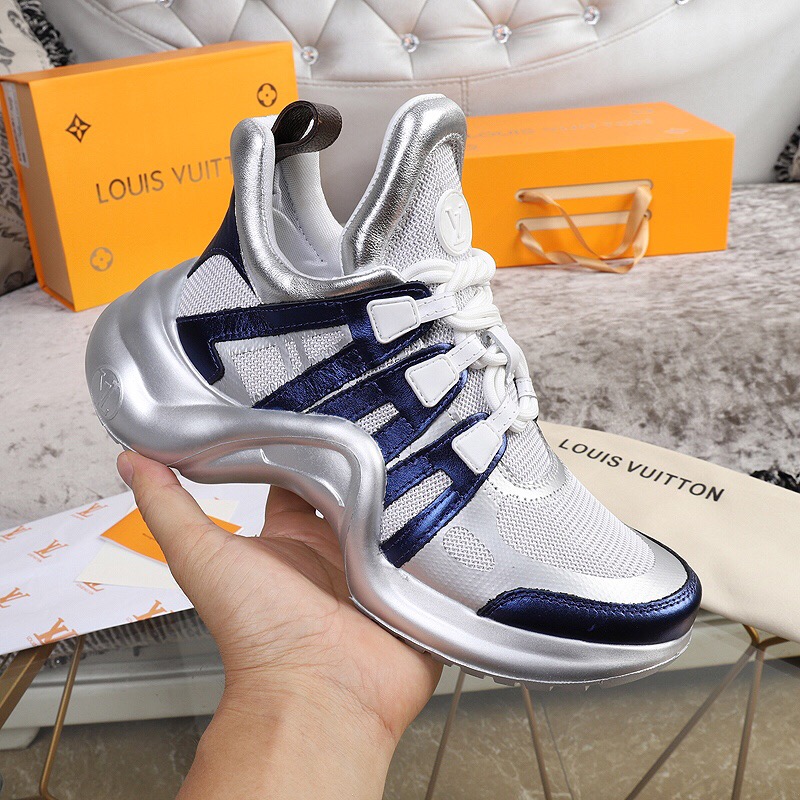 LOUIS VUITTON 'Archlight' Trainer. Original Quality Sneaker including gift box, care book, dust bag, authenticity card. This futuristic sneaker balances a springy wave-shaped outsole and an oversized tongue with a low cut around the ankle for a delicate, feminine touch.