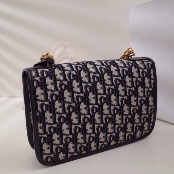 DIOR Vintage Oblique Canvas  'DiorAddict' Small Shoulder and Crossbody Bag. Original Quality Bag. Authentic cowhide trim and jacquard canvas. Leather. Metal Toned Hardware. DIOR Sales Box and Dust Bag. Booklet, Authenticity Card, Payment Slip. We are introducing the Dior Oblique Signature Canvas Bags. This pattern has taken its inspiration from Dior’s vintage design from the 70s. It was first introduced in the brand’s Fall/Winter 2017 Collection. It is made of jacquard canvas called Flanders Tapestry. The canvas comes with blue smooth calfskin details with aged gold-tone metal. The design is available in the brand’s different handbags such as DiorAddict, Dioravenue, Flap Bag, Bowling Bag, and Duffle and Tote.