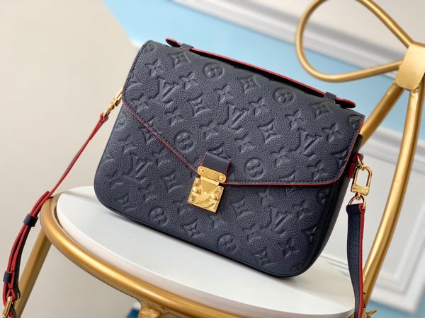 LOUIS VUITTON Pochette Métis Monogram Empreinte Leather. Original Quality Bag. Gold-metal toned Hardware. LOUIS VUITTON Sales Box and Dust Bag. Booklet, Authenticity Card, Payment Slip. Elegance is personified in the petite shape of the Pochette Métis. Made of supple Monogram empreinte leather, its compact dimensions open up to reveal many useful pockets and compartments.