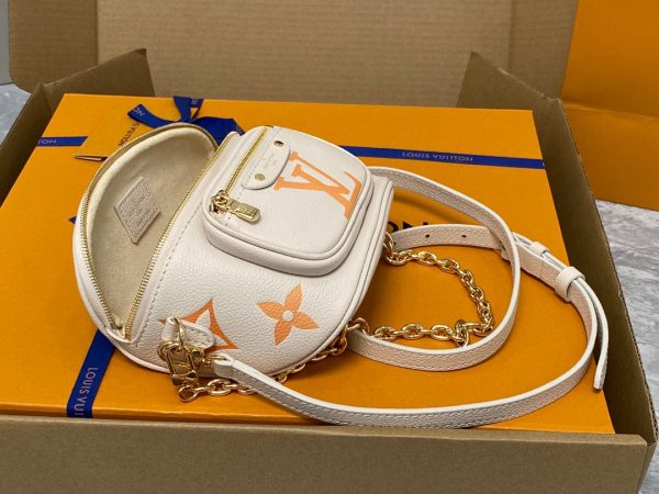 LOUIS VUITTON Mini Bumbag. High-End Quality Bag including gift box, care book, dust bag, authenticity card. Part of Louis Vuitton's Gradient Collection, the Mini Bumbag is an elegant take on the on-trend bag format. Crafted from Monogram Empreinte leather with a stunning printed gradation of colors, this bag will make a stylish addition to your accessory wardrobe. It features a zipped main compartment with a front pocket adorned with a Louis Vuitton leather tag as well as adjustable, removable straps that you can use for either cross-body or shoulder wear. This Mini Bumbag also comes with a stylish, gold-tone chain making it the perfect accessory for any summer occasion.