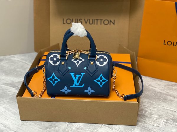 LOUIS VUITTON Speedy Bandoulière 20. Experience elegance and sophistication with this timeless designer handbag. This is an iconic and stylish designer handbag, perfect for any fashionable woman. The Speedy Bandoulière 20 has all the features that make Louis Vuitton such a sought-after luxury brand. This bag has a resilient material, deep pockets, a spacious interior, and an adjustable shoulder strap. The exterior is crafted from durable and elegant Monogram canvas, giving it a timeless style that will last for years. It also features a discreet Lozine trim, making it both striking and sophisticated. Inside, it is lined with matching textiles with a pocket for small items, ensuring all your essentials are secure and organized. The adjustable strap allows you to wear the bag on the shoulder or carry it as a top handle bag, making it perfect for either day or night. And with a zip closure, you can always rest assured that all your items are safely contained. The Speedy Bandoulière 20 is sure to add a touch of luxury to any look.