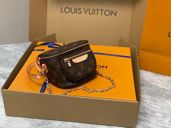 LOUIS VUITTON Mini Bumbag. High-End Quality Bag including gift box, care book, dust bag, authenticity card. Part of Louis Vuitton's Gradient Collection, the Mini Bumbag is an elegant take on the on-trend bag format. Crafted from Monogram Empreinte leather with a stunning printed gradation of colors, this bag will make a stylish addition to your accessory wardrobe. It features a zipped main compartment with a front pocket adorned with a Louis Vuitton leather tag as well as adjustable, removable straps that you can use for either cross-body or shoulder wear. This Mini Bumbag also comes with a stylish, gold-tone chain making it the perfect accessory for any summer occasion.