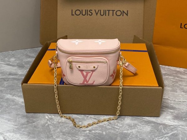 LOUIS VUITTON Mini Bumbag. High-End Quality Bag including gift box, care book, dust bag, authenticity card. Part of Louis Vuitton's Gradient Collection, the Mini Bumbag is an elegant take on the on-trend bag format. Crafted from Monogram Empreinte leather with a stunning printed gradation of colors, this bag will make a stylish addition to your accessory wardrobe. It features a zipped main compartment with a front pocket adorned with a Louis Vuitton leather tag as well as adjustable, removable straps that you can use for either cross-body or shoulder wear. This Mini Bumbag also comes with a stylish, gold-tone chain making it the perfect accessory for any summer occasion.