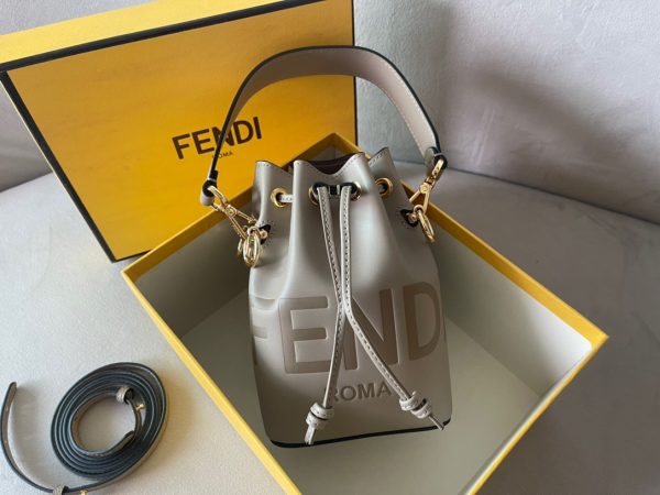 FENDI Mon Tresor Mini Bucket Bag: Style Meets Practicality This Mon Tresor Bag is a chic, minimalist dream. With its drawstring fastening and metal detailing on the sides and eyelets, this bag is as practical as a backpack and can be worn in different ways with its two detachable shoulder straps. It promises a spacious interior and supple leather construction to help store more than the average duffle bag or shoulder bag can manage. Despite it's thoughtfully practical design, it still looks luxurious and glamorous - no wonder it comes with a designer price tag!