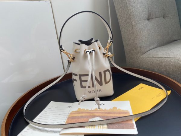 FENDI Mon Tresor Mini Bucket Bag: Style Meets Practicality This Mon Tresor Bag is a chic, minimalist dream. With its drawstring fastening and metal detailing on the sides and eyelets, this bag is as practical as a backpack and can be worn in different ways with its two detachable shoulder straps. It promises a spacious interior and supple leather construction to help store more than the average duffle bag or shoulder bag can manage. Despite it's thoughtfully practical design, it still looks luxurious and glamorous - no wonder it comes with a designer price tag!