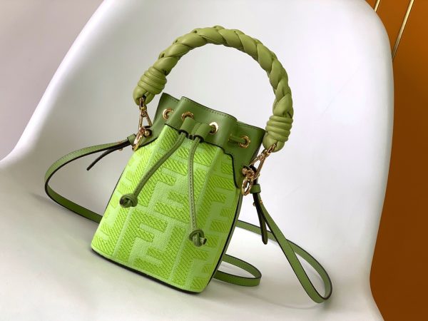 FENDI Mon Tresor Mini Bucket Bag: Style Meets Practicality This Mon Tresor Bag is a chic, minimalist dream. With its drawstring fastening and metal detailing on the sides and eyelets, this bag is as practical as a backpack and can be worn in different ways with its two detachable shoulder straps. It promises a spacious interior and supple leather construction to help store more than the average duffle bag or shoulder bag can manage. Despite it's thoughtfully practical design, it still looks luxurious and glamorous - no wonder it comes with a designer price tag!