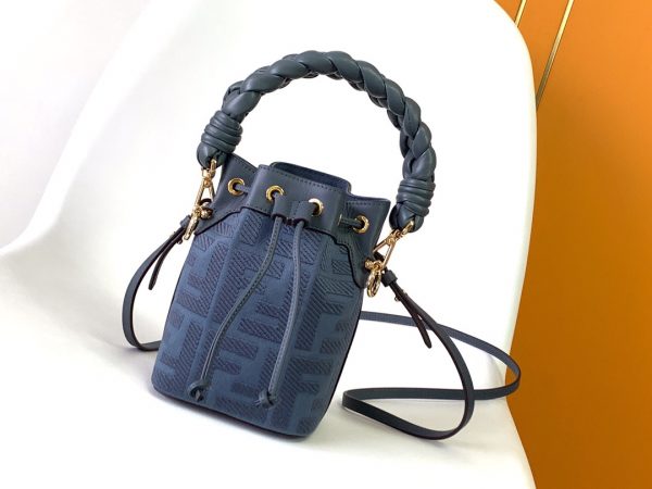 FENDI Mon Tresor Mini Bucket Bag: Style Meets Practicality This Mon Tresor Bag is a chic, minimalist dream. With its drawstring fastening and metal detailing on the sides and eyelets, this bag is as practical as a backpack and can be worn in different ways with its two detachable shoulder straps. It promises a spacious interior and supple leather construction to help store more than the average duffle bag or shoulder bag can manage. Despite it's thoughtfully practical design, it still looks luxurious and glamorous - no wonder it comes with a designer price tag!