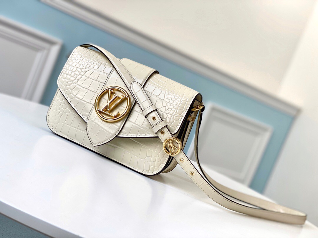 LOUIS VUITTON Pont 9. Original Quality Bag including gift box, literature, dust bag, authenticity card. The structured yet curved lines of the LV Pont 9 handbag are fashioned from smooth leather. The LV Circle, a classic House signature reinterpreted by Nicolas Ghesquière, adorns the bag’s flap and the adjustable strap’s buckle. Hidden features such as a colored leather lining and Monogram Flower magnetic closure on the flap’s underside bring subtle sophistication.