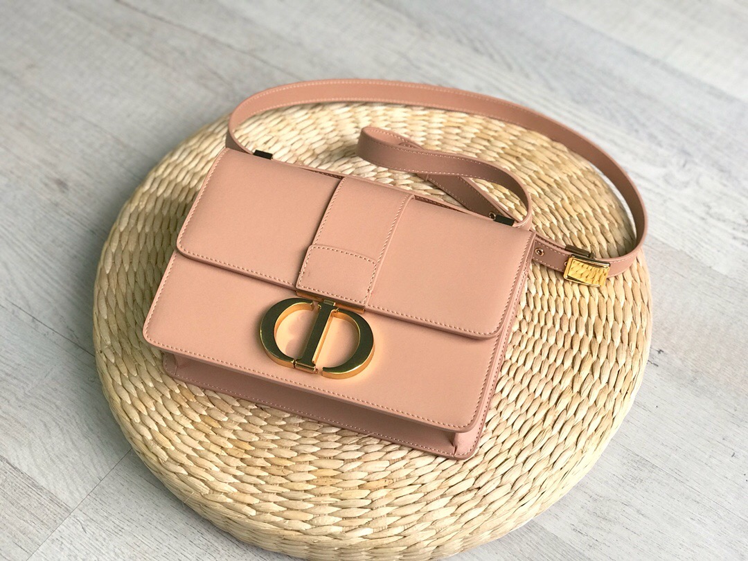 DIOR 30 Montaigne Shoulder Bag. Original Quality Bag. Authentic calfskin. Metal Toned Hardware. DIOR Sales Box and Dust Bag. Booklet, Authenticity Card. Dior released its latest buzzy bag, the 30 Montaigne—named for the house’s flagship address in Paris. Designed by Maria Grazia Chiuri and first spotted on the Dior pre-fall 19 collection, the box bag is inspired by silhouettes from the 1960s and adorned with a shoulder strap and the brand’s signature DIOR logo clasp on the front.