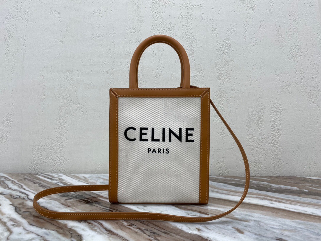 CELINE Cabas Triomphe Mini. Original Quality Bag including gift box, care book, dust bag, authenticity card. The Triomphe bag wasn’t really loved in the beginning, but its gaining traction and fame. The story started with the CELINE Triomphe bag, a magnificent bag that’s named after the Arc the Triomphe. A new chapter has started, CELINE has completed an entire collection of the Triomphe line. It includes a tote bag, bucket bag, camera bag, drawstring bag, and a Boston bag. All of these styles are made from Triomphe canvas and with calfskin trimming.