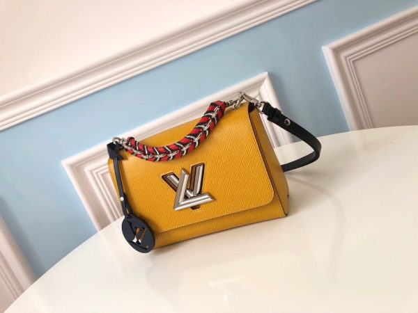 LOUIS VUITTON TWIST Medium Model. Original Quality Bag including gift box, care book, dust bag, authenticity card. For Fall 2019, the Twist MM handbag comes in Epi leather with a braided handle and removable LV Initials charm, echoing the initials of the emblematic LV twist-lock. The luxurious braided handle enables hand-carry whilst the removable leather strap allows the Twist to be carried over the shoulder or cross-body.