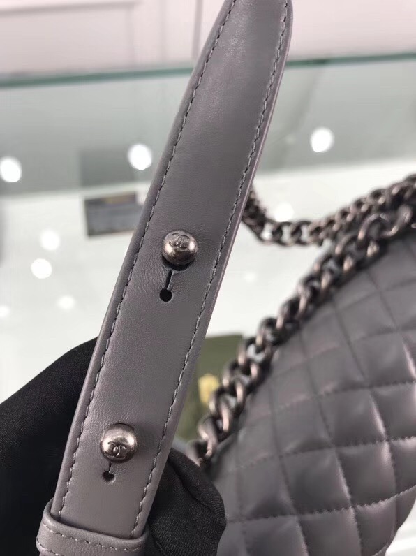 CHANEL 'Boy' Diamond Quilted Leather Flap Bag. Original Quality Bag including gift box, care book, dust bag, authenticity card. Created by Karl Lagerfeld, the iconic design owes its name to Gabrielle Chanel's first love, Boy Capel. This Chanel Boy Flap Bag Quilted is every woman's dream. Crafted from calfskin leather, the bag features Chanel's signature diamond quilting, chunky chain link strap with leather shoulder pad, and metal-tone hardware accents. Its CC Boy logo closure opens to a fabric-lined interior with slip pocket perfect for daily essentials. A sought-after, luxurious accessory.