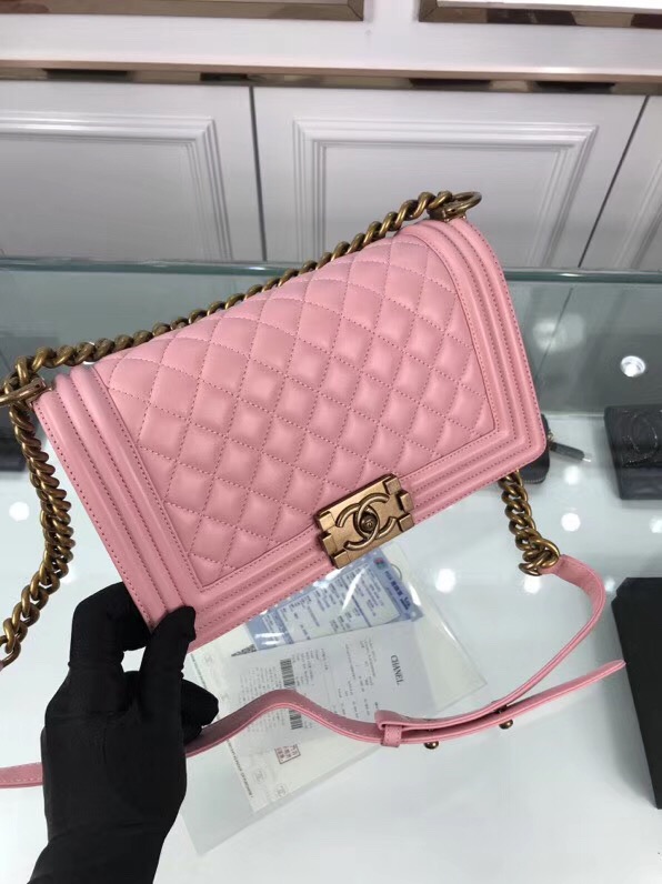 CHANEL 'Boy' Diamond Quilted Leather Flap Bag. Original Quality Bag including gift box, care book, dust bag, authenticity card. Created by Karl Lagerfeld, the iconic design owes its name to Gabrielle Chanel's first love, Boy Capel. This Chanel Boy Flap Bag Quilted is every woman's dream. Crafted from calfskin leather, the bag features Chanel's signature diamond quilting, chunky chain link strap with leather shoulder pad, and metal-tone hardware accents. Its CC Boy logo closure opens to a fabric-lined interior with slip pocket perfect for daily essentials. A sought-after, luxurious accessory.