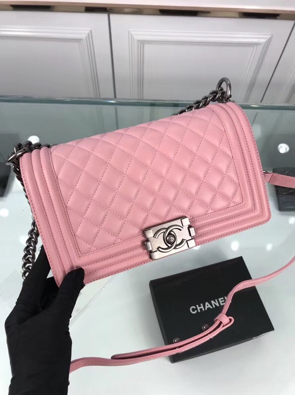 CHANEL 'Boy' Diamond Quilted Leather Flap Bag. Original Quality Bag including gift box, care book, dust bag, authenticity card. Created by Karl Lagerfeld, the iconic design owes its name to Gabrielle Chanel's first love, Boy Capel. This Chanel Boy Flap Bag Quilted is every woman's dream. Crafted from calfskin leather, the bag features Chanel's signature diamond quilting, chunky chain link strap with leather shoulder pad, and metal-tone hardware accents. Its CC Boy logo closure opens to a fabric-lined interior with slip pocket perfect for daily essentials. A sought-after, luxurious accessory.