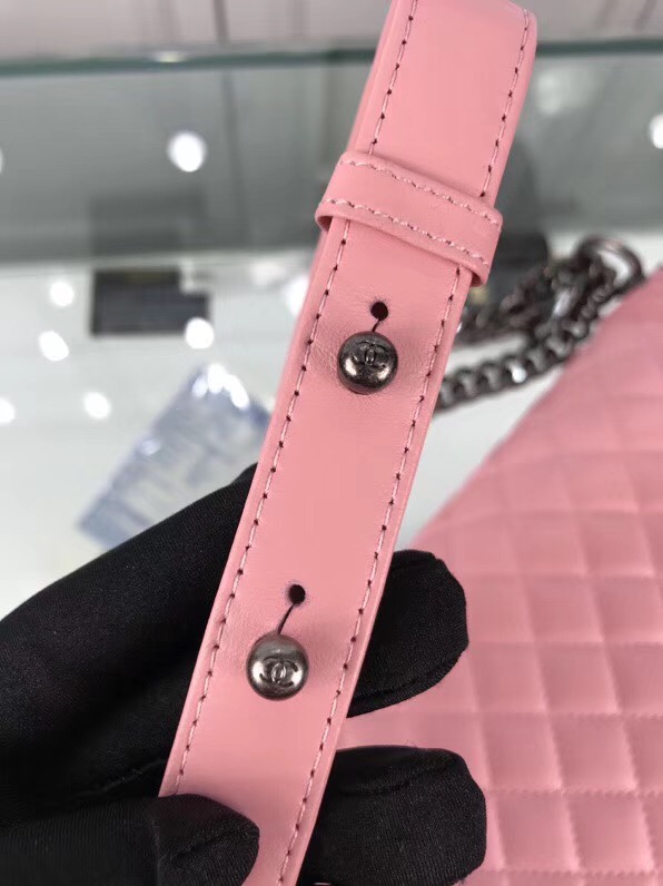 CHANEL 'Boy' Diamond Quilted Leather Flap Bag. Original Quality Bag including gift box, care book, dust bag, authenticity card. Created by Karl Lagerfeld, the iconic design owes its name to Gabrielle Chanel's first love, Boy Capel. This Chanel Boy Flap Bag Quilted is every woman's dream. Crafted from calfskin leather, the bag features Chanel's signature diamond quilting, chunky chain link strap with leather shoulder pad, and metal-tone hardware accents. Its CC Boy logo closure opens to a fabric-lined interior with slip pocket perfect for daily essentials. A sought-after, luxurious accessory.