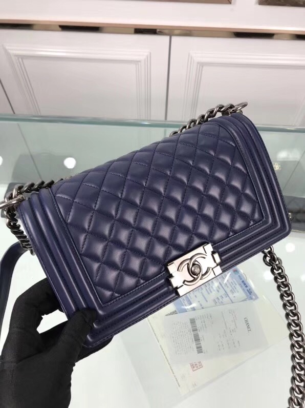 CHANEL 'Boy' Diamond Quilted Leather Flap Bag. Original Quality Bag including gift box, care book, dust bag, authenticity card. Created by Karl Lagerfeld, the iconic design owes its name to Gabrielle Chanel's first love, Boy Capel. This Chanel Boy Flap Bag Quilted is every woman's dream. Crafted from calfskin leather, the bag features Chanel's signature diamond quilting, chunky chain link strap with leather shoulder pad, and metal-tone hardware accents. Its CC Boy logo closure opens to a fabric-lined interior with slip pocket perfect for daily essentials. A sought-after, luxurious accessory.