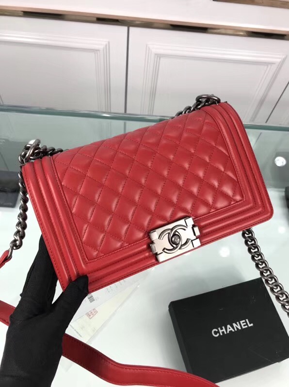 CHANEL 'Boy' Diamond Quilted Leather Flap Bag. Original Quality Bag including gift box, care book, dust bag, authenticity card. Created by Karl Lagerfeld, the iconic design owes its name to Gabrielle Chanel's first love, Boy Capel. This Chanel Boy Flap Bag Quilted is every woman's dream. Crafted from calfskin leather, the bag features Chanel's signature diamond quilting, chunky chain link strap with leather shoulder pad, and metal-tone hardware accents. Its CC Boy logo closure opens to a fabric-lined interior with slip pocket perfect for daily essentials. A sought-after, luxurious accessory.