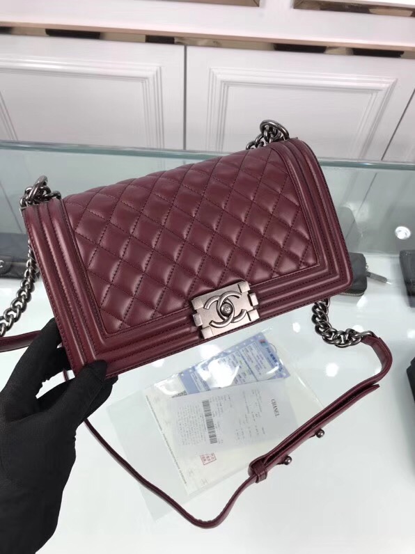 CHANEL 'Boy' Diamond Quilted Leather Flap Bag. Original Quality Bag including gift box, care book, dust bag, authenticity card. Created by Karl Lagerfeld, the iconic design owes its name to Gabrielle Chanel's first love, Boy Capel. This Chanel Boy Flap Bag Quilted is every woman's dream. Crafted from calfskin leather, the bag features Chanel's signature diamond quilting, chunky chain link strap with leather shoulder pad, and metal-tone hardware accents. Its CC Boy logo closure opens to a fabric-lined interior with slip pocket perfect for daily essentials. A sought-after, luxurious accessory.