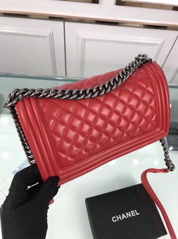 CHANEL 'Boy' Diamond Quilted Leather Flap Bag. Original Quality Bag including gift box, care book, dust bag, authenticity card. Created by Karl Lagerfeld, the iconic design owes its name to Gabrielle Chanel's first love, Boy Capel. This Chanel Boy Flap Bag Quilted is every woman's dream. Crafted from calfskin leather, the bag features Chanel's signature diamond quilting, chunky chain link strap with leather shoulder pad, and metal-tone hardware accents. Its CC Boy logo closure opens to a fabric-lined interior with slip pocket perfect for daily essentials. A sought-after, luxurious accessory.