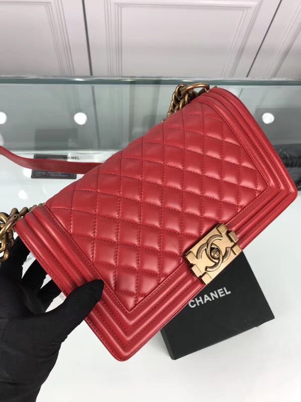 CHANEL 'Boy' Diamond Quilted Leather Flap Bag. Original Quality Bag including gift box, care book, dust bag, authenticity card. Created by Karl Lagerfeld, the iconic design owes its name to Gabrielle Chanel's first love, Boy Capel. This Chanel Boy Flap Bag Quilted is every woman's dream. Crafted from calfskin leather, the bag features Chanel's signature diamond quilting, chunky chain link strap with leather shoulder pad, and metal-tone hardware accents. Its CC Boy logo closure opens to a fabric-lined interior with slip pocket perfect for daily essentials. A sought-after, luxurious accessory.