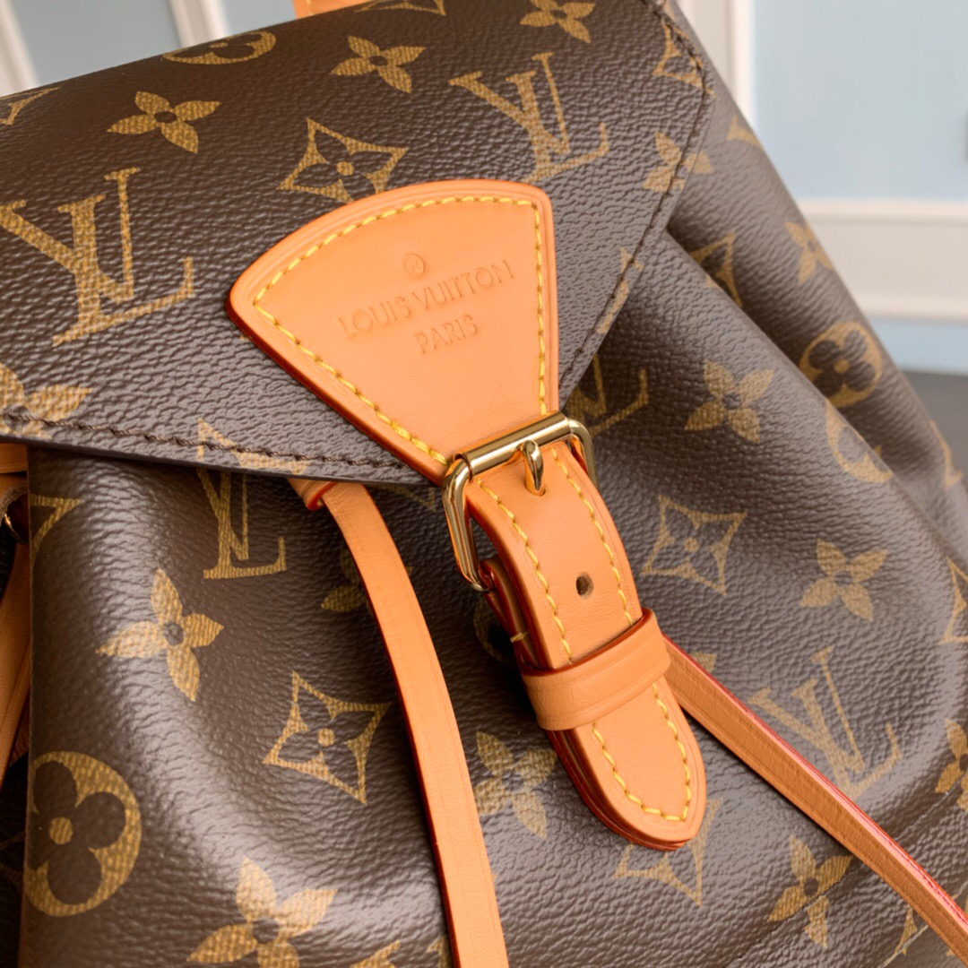 LOUIS VUITTON Montsouris Backpack. Original Quality Bag including gift box, care book, dust bag, authenticity card. This is an elegant new backpack made from Monogram canvas and cowhide leather, it closes with an archive Louis Vuitton buckle and leather drawstrings. Practical, with a roomy interior, it features an outside zipped pocket. The top handle and adjustable leather straps allow multiple carry options.