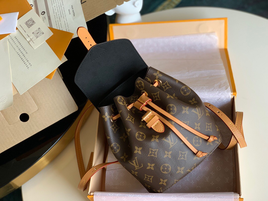 LOUIS VUITTON Montsouris Backpack. Original Quality Bag including gift box, care book, dust bag, authenticity card. This is an elegant new backpack made from Monogram canvas and cowhide leather, it closes with an archive Louis Vuitton buckle and leather drawstrings. Practical, with a roomy interior, it features an outside zipped pocket. The top handle and adjustable leather straps allow multiple carry options.