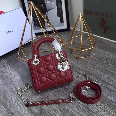 DIOR Mini ‘Lady DIOR’ Bag. Original Quality Bag including gift box, care book, dust bag, authenticity card. This Mini bag epitomizes Dior's vision of elegance and beauty. Sleek and refined, the timeless yet relevant style is crafted in calfskin/lambskin with Cannage stitching, creating the instantly recognizable quilted texture. The metal 'D.I.O.R.' charms further embellish the silhouette. Featuring a removable chain shoulder strap, this bag is the ideal evening companion.