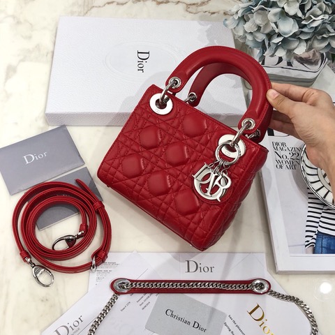 DIOR Mini ‘Lady DIOR’ Bag. Original Quality Bag including gift box, care book, dust bag, authenticity card. This Mini bag epitomizes Dior's vision of elegance and beauty. Sleek and refined, the timeless yet relevant style is crafted in calfskin/lambskin with Cannage stitching, creating the instantly recognizable quilted texture. The metal 'D.I.O.R.' charms further embellish the silhouette. Featuring a removable chain shoulder strap, this bag is the ideal evening companion.