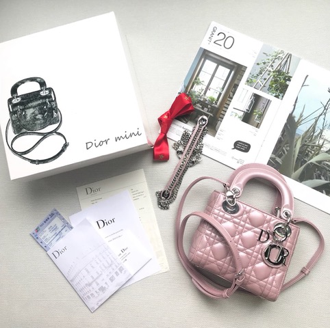 DIOR Mini ‘Lady DIOR’ Bag. Original Quality Bag including gift box, care book, dust bag, authenticity card. This Mini bag epitomizes Dior's vision of elegance and beauty. Sleek and refined, the timeless yet relevant style is crafted in calfskin/lambskin with Cannage stitching, creating the instantly recognizable quilted texture. The metal 'D.I.O.R.' charms further embellish the silhouette. Featuring a removable chain shoulder strap, this bag is the ideal evening companion.