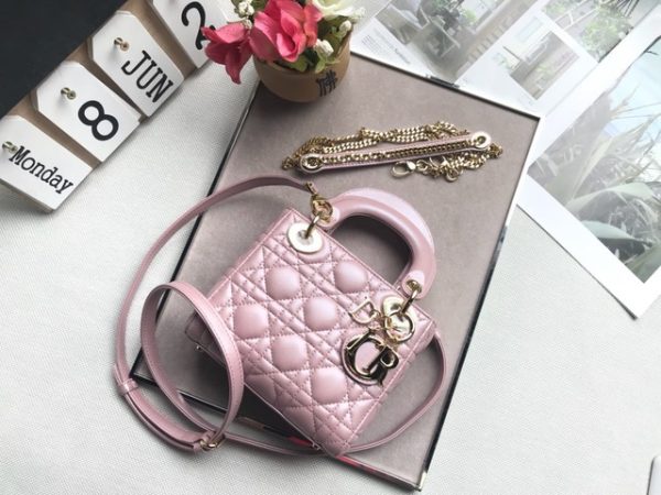 DIOR Mini ‘Lady DIOR’ Bag. Original Quality Bag including gift box, care book, dust bag, authenticity card. This Mini bag epitomizes Dior's vision of elegance and beauty. Sleek and refined, the timeless yet relevant style is crafted in calfskin/lambskin with Cannage stitching, creating the instantly recognizable quilted texture. The metal 'D.I.O.R.' charms further embellish the silhouette. Featuring a removable chain shoulder strap, this bag is the ideal evening companion.