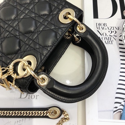 DIOR Mini ‘Lady DIOR’ Bag. Original Quality Bag including gift box, care book, dust bag, authenticity card. This Mini bag epitomizes Dior's vision of elegance and beauty. Sleek and refined, the timeless yet relevant style is crafted in calfskin/lambskin with Cannage stitching, creating the instantly recognizable quilted texture. The metal 'D.I.O.R.' charms further embellish the silhouette. Featuring a removable chain shoulder strap, this bag is the ideal evening companion.