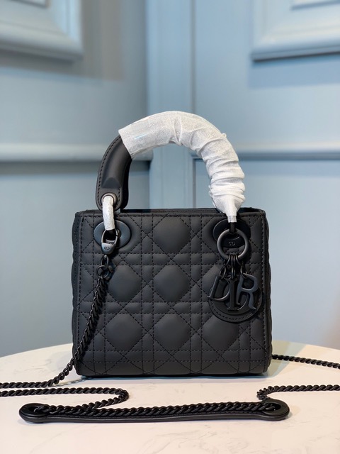 DIOR Mini ‘Lady DIOR’ Bag. Original Quality Bag including gift box, care book, dust bag, authenticity card. This Mini bag epitomizes Dior's vision of elegance and beauty. Sleek and refined, the timeless yet relevant style is crafted in calfskin/lambskin with Cannage stitching, creating the instantly recognizable quilted texture. The metal 'D.I.O.R.' charms further embellish the silhouette. Featuring a removable chain shoulder strap, this bag is the ideal evening companion.