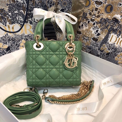 DIOR Mini ‘Lady DIOR’ Bag. Original Quality Bag including gift box, care book, dust bag, authenticity card. This Mini bag epitomizes Dior's vision of elegance and beauty. Sleek and refined, the timeless yet relevant style is crafted in calfskin/lambskin with Cannage stitching, creating the instantly recognizable quilted texture. The metal 'D.I.O.R.' charms further embellish the silhouette. Featuring a removable chain shoulder strap, this bag is the ideal evening companion.