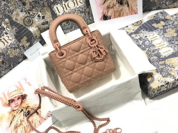 DIOR Mini ‘Lady DIOR’ Bag. Original Quality Bag including gift box, care book, dust bag, authenticity card. This Mini bag epitomizes Dior's vision of elegance and beauty. Sleek and refined, the timeless yet relevant style is crafted in calfskin/lambskin with Cannage stitching, creating the instantly recognizable quilted texture. The metal 'D.I.O.R.' charms further embellish the silhouette. Featuring a removable chain shoulder strap, this bag is the ideal evening companion.