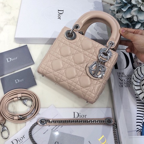 DIOR Mini ‘Lady DIOR’ Bag. Original Quality Bag including gift box, care book, dust bag, authenticity card. This Mini bag epitomizes Dior's vision of elegance and beauty. Sleek and refined, the timeless yet relevant style is crafted in calfskin/lambskin with Cannage stitching, creating the instantly recognizable quilted texture. The metal 'D.I.O.R.' charms further embellish the silhouette. Featuring a removable chain shoulder strap, this bag is the ideal evening companion.