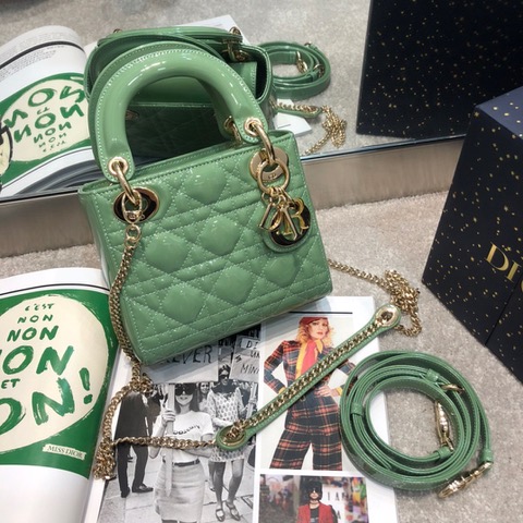 DIOR Mini ‘Lady DIOR’ Bag. Original Quality Bag including gift box, care book, dust bag, authenticity card. This Mini bag epitomizes Dior's vision of elegance and beauty. Sleek and refined, the timeless yet relevant style is crafted in calfskin/lambskin with Cannage stitching, creating the instantly recognizable quilted texture. The metal 'D.I.O.R.' charms further embellish the silhouette. Featuring a removable chain shoulder strap, this bag is the ideal evening companion.