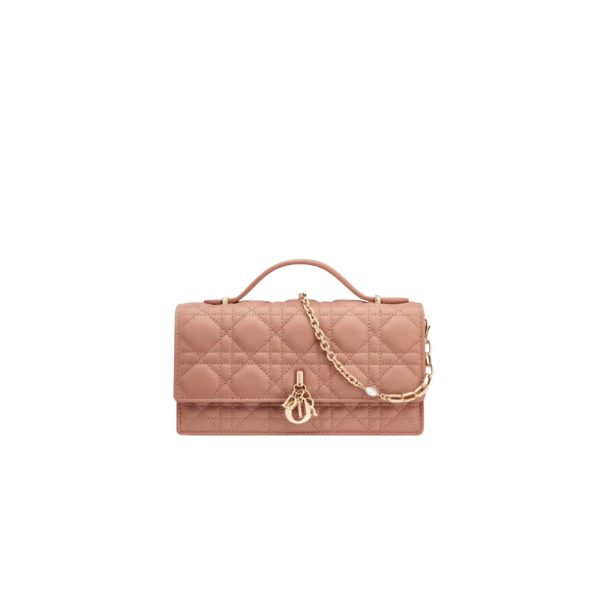 DIOR Lady Dior Top Handle Clutch. Original Quality Bag including gift box, care book, dust bag, authenticity card. New this season, this elegant, functional clutch enriches the Lady Dior line. Crafted in Cannage lambskin, it features a flap enhanced by the 'D.I.O.R." charm. Featuring compartments and card slots, the functional accessory holds all the essentials and is the ideal day and evening companion. A top handle completed by a removable chain punctuated with beads allows the bag to be carried by hand or worn crossbody.