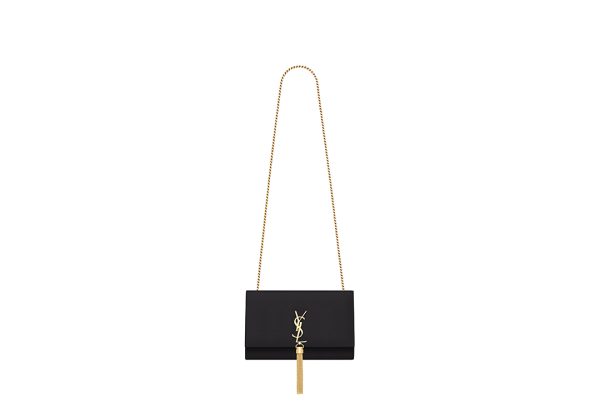 SAINT LAURENT Small 'Kate' Bag with Tassel. Original Quality Bag including gift box, care book, dust bag, authenticity card. Monogram Saint Laurent bag adorned with a curb chain, interlocking YSL initials in metal, and a metallic tassel. Crafted from leather, this Kate shoulder bag from Saint Laurent is decorated with a signature YSL monogram plaque and a hanging tassel detail to the front for an extra refined touch. The perfect go-to for a night out. Featuring a chain shoulder strap, a foldover top with magnetic closure, a main internal compartment, an internal slip pocket, an internal logo patch, an internal logo stamp, and metal hardware.